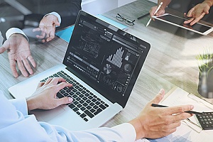 a business owner viewing the results of a gap analysis for his organization